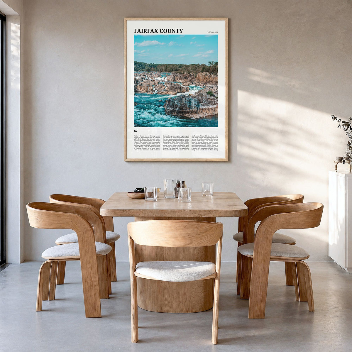 Fairfax County Travel Poster in a natural wood frame, hanging in a dining room