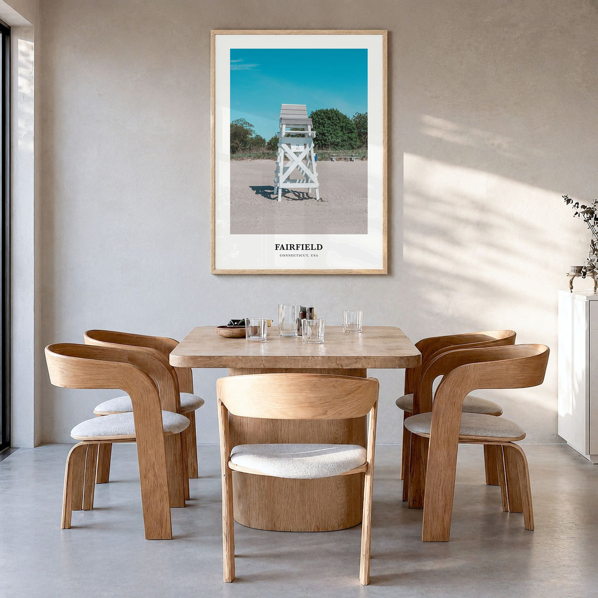 Fairfield Classic Poster in a natural wood frame, hanging in a dining room