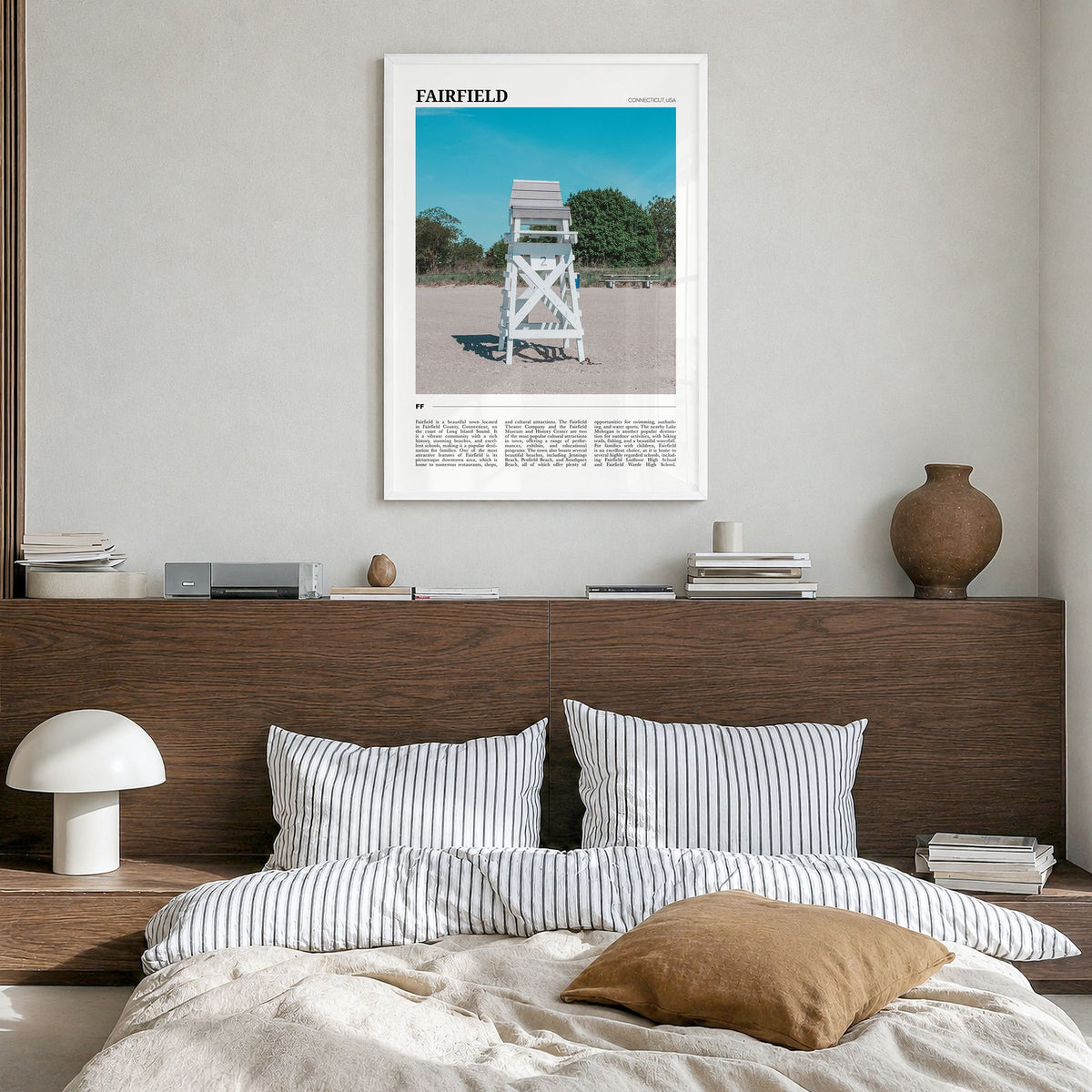 Fairfield Travel Poster in a white wood frame, hanging in a bedroom