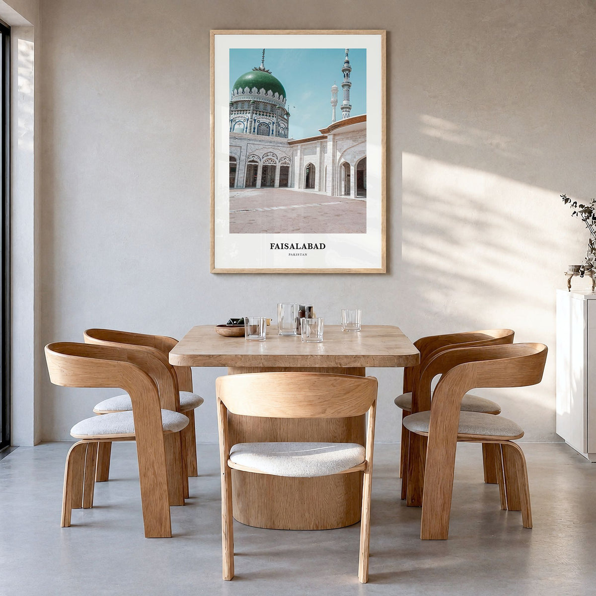 Faisalabad Classic Poster in a natural wood frame, hanging in a dining room