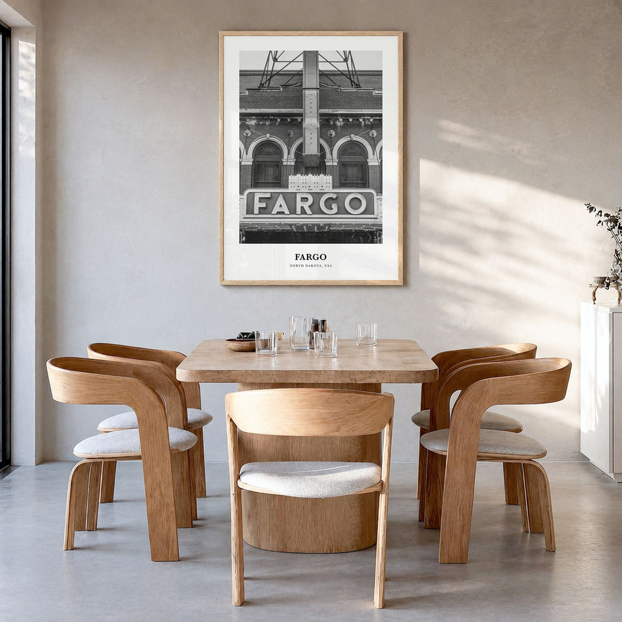 Fargo Classic No 2 Poster in a natural wood frame, hanging in a dining room