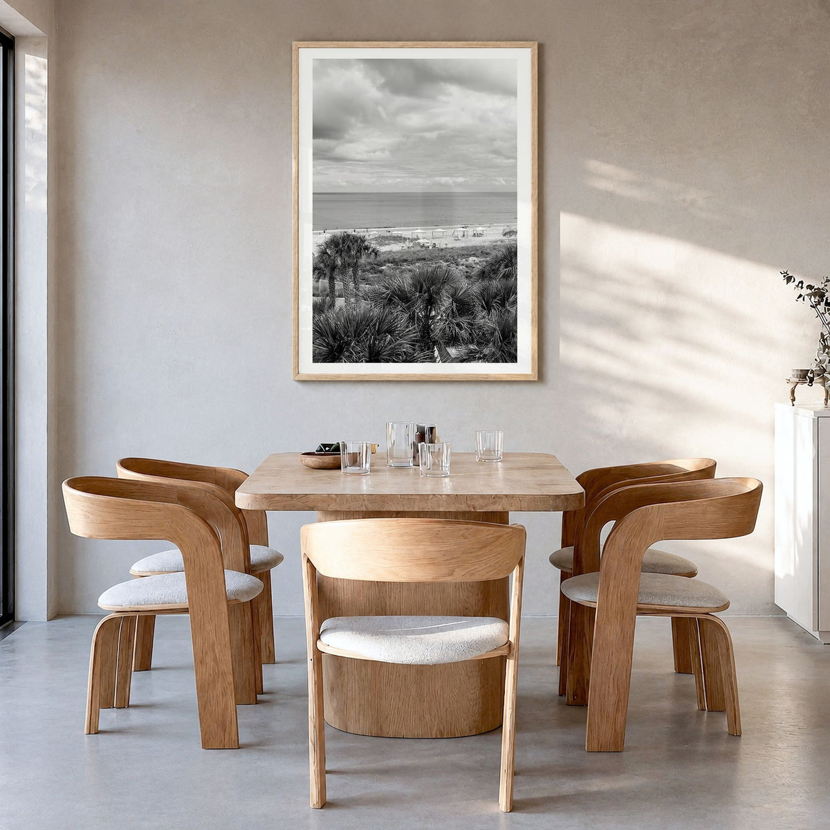 Fernandina Beach Photo Poster in a natural wood frame, hanging in a dining room, white border