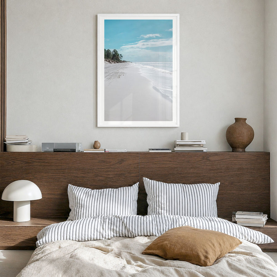 Fernandina Beach Photo Poster in a white wood frame, hanging in a bedroom, white border