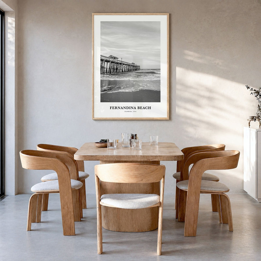 Fernandina Beach Classic Poster in a natural wood frame, hanging in a dining room