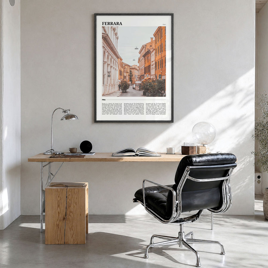 Ferrara Travel Poster in a black wood frame, hanging in a bright home office