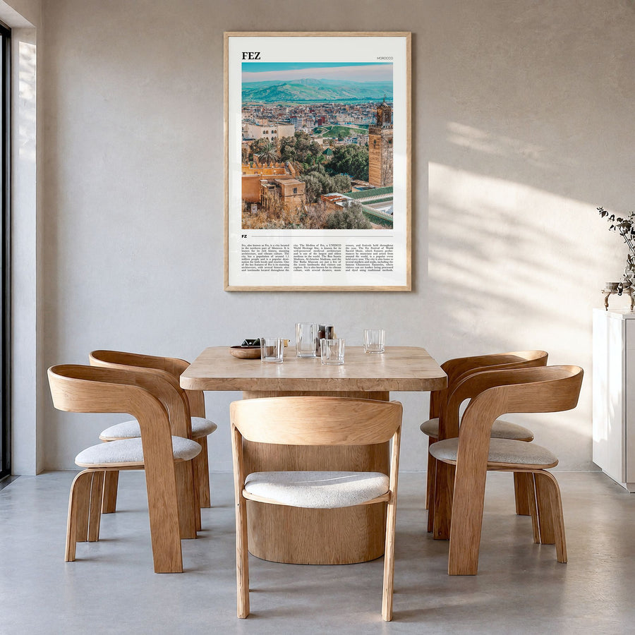Fez Travel Poster in a natural wood frame, hanging in a dining room