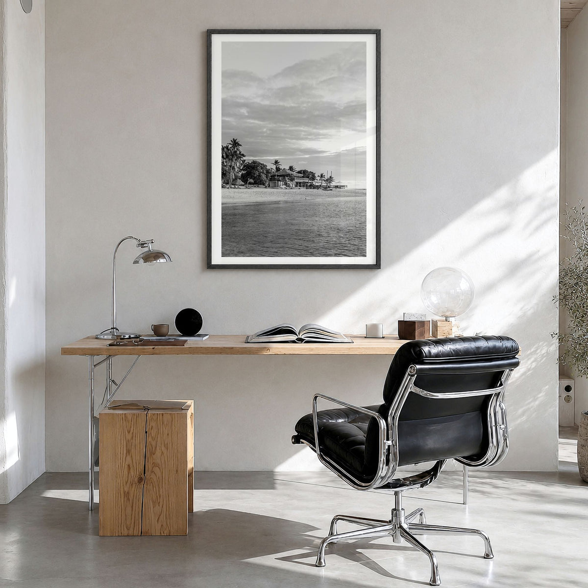Fiji Photo Poster in a black wood frame, hanging in a bright home office, white border
