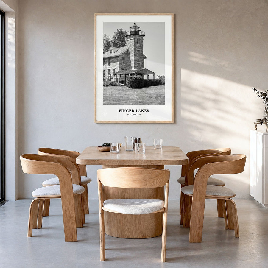 Finger Lakes Classic Poster in a natural wood frame, hanging in a dining room