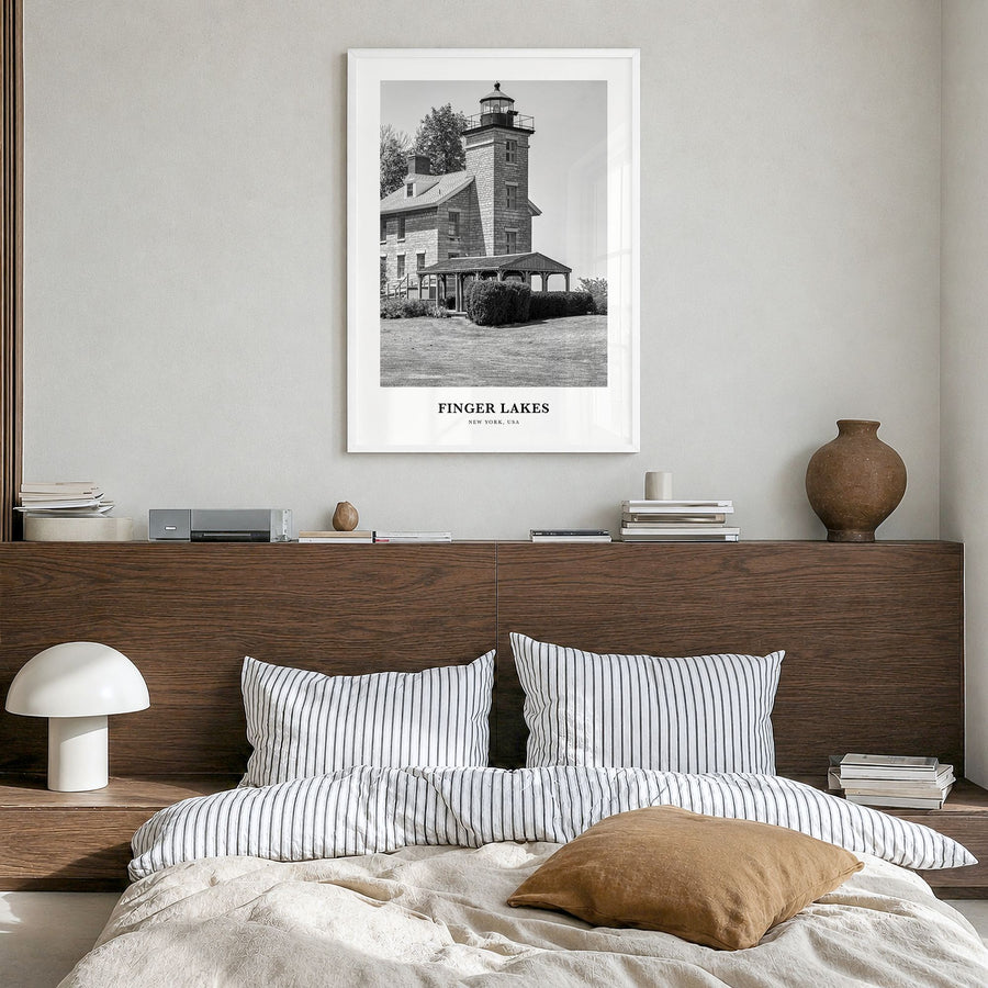 Finger Lakes Classic Poster in a white wood frame, hanging in a bedroom