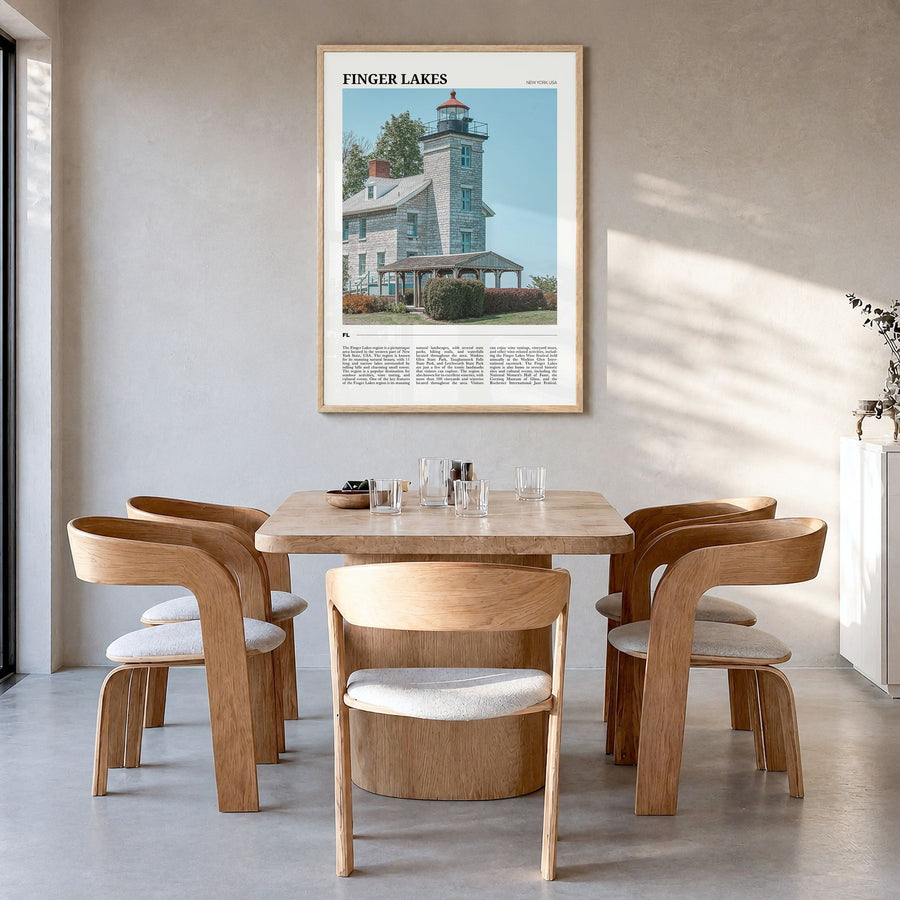 Finger Lakes Travel Poster in a natural wood frame, hanging in a dining room