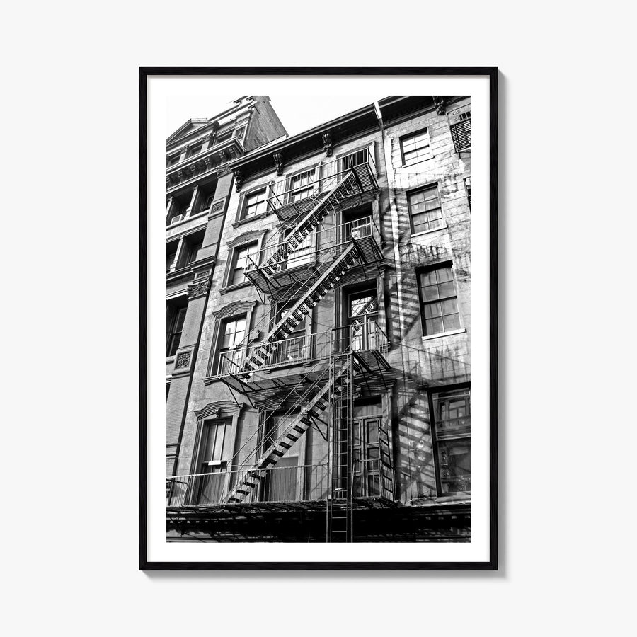 Fire Escapes no. 1 black & white photo poster – vertical wall art, unframed print shown in interior mockup