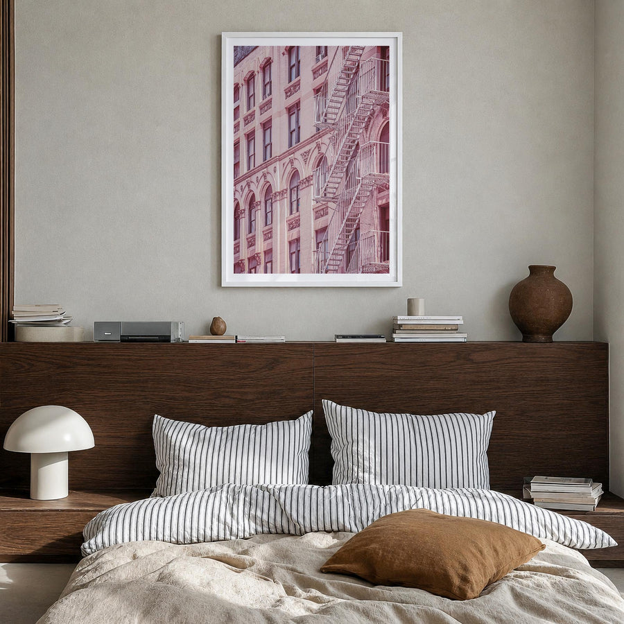 Fire Escapes no. 2 colorful photo poster – vertical wall art in white wood frame with white border, hanging on wall