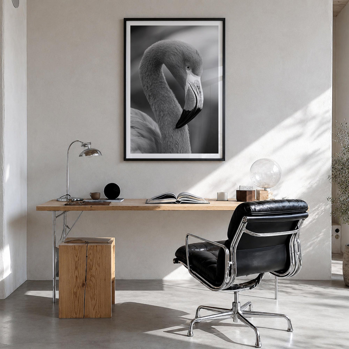 Flamingo black & white photo poster – vertical wall art in black wood frame with white border, hanging on wall