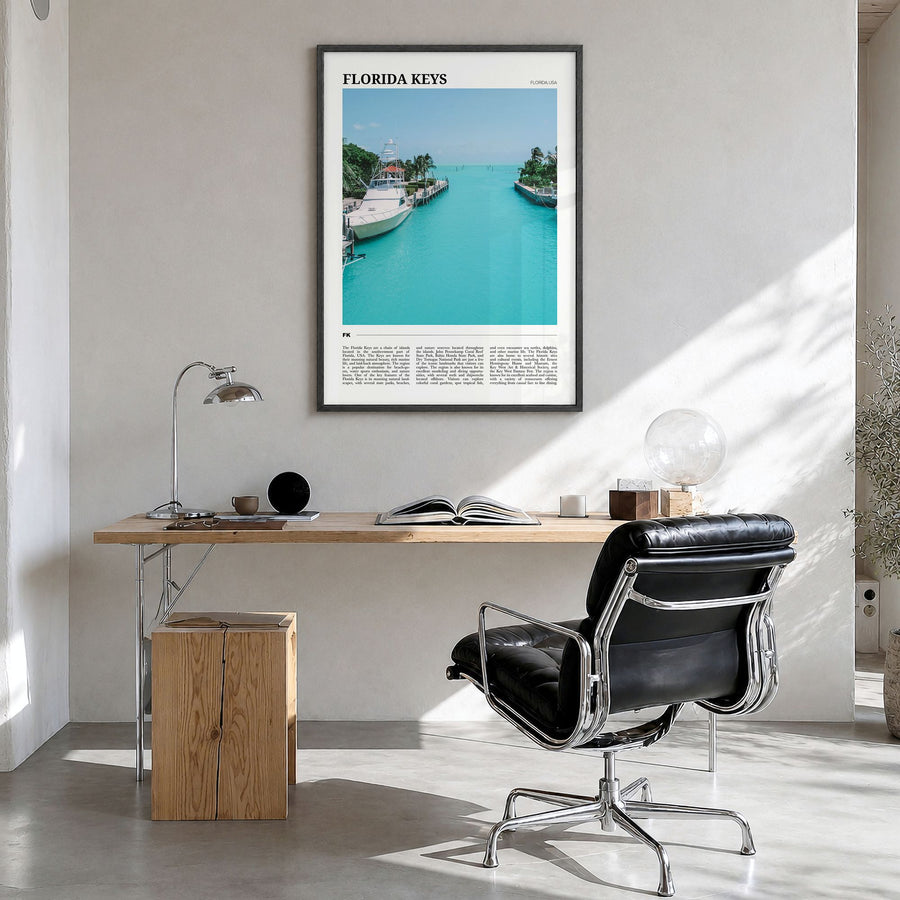 Florida Keys Travel Poster in a black wood frame, hanging in a bright home office
