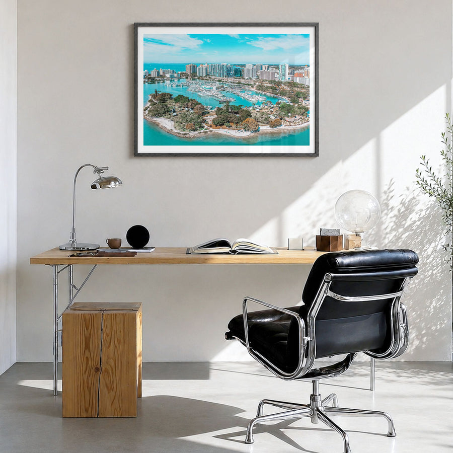 Florida Photo Poster in a black wood frame, hanging in a bright home office, white border