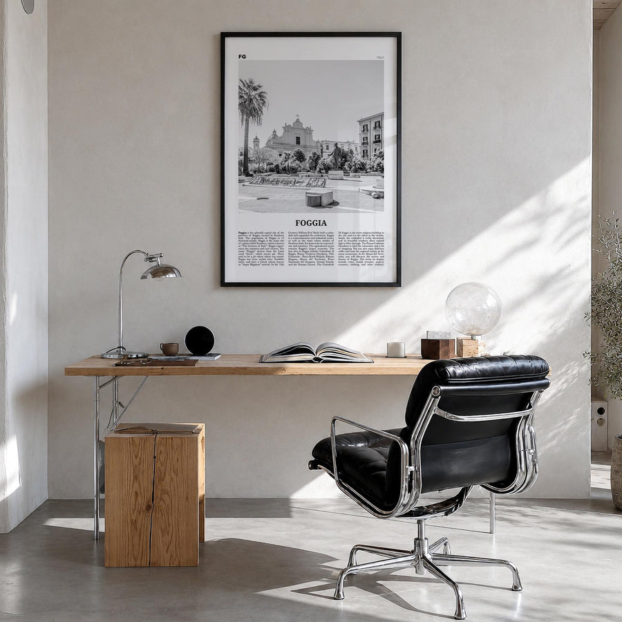 Foggia black & white newspaper poster of Italy – vertical wall art in black wood frame, hanging on wall