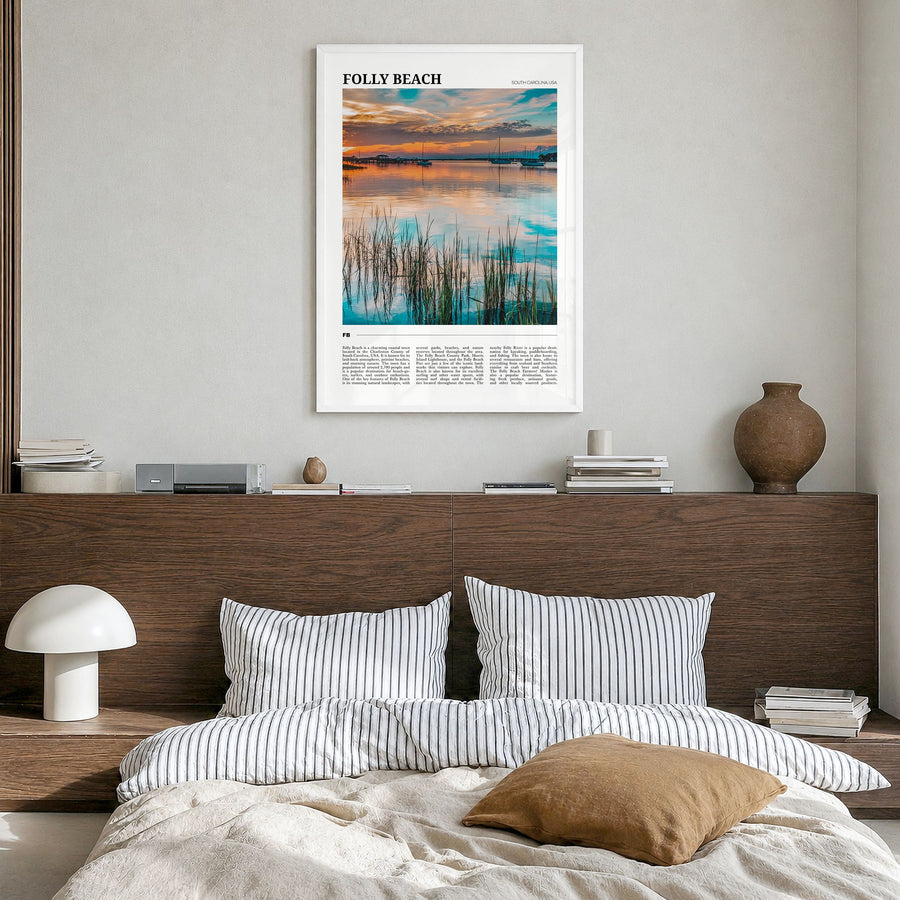 Folly Beach Travel Poster in a white wood frame, hanging in a bedroom
