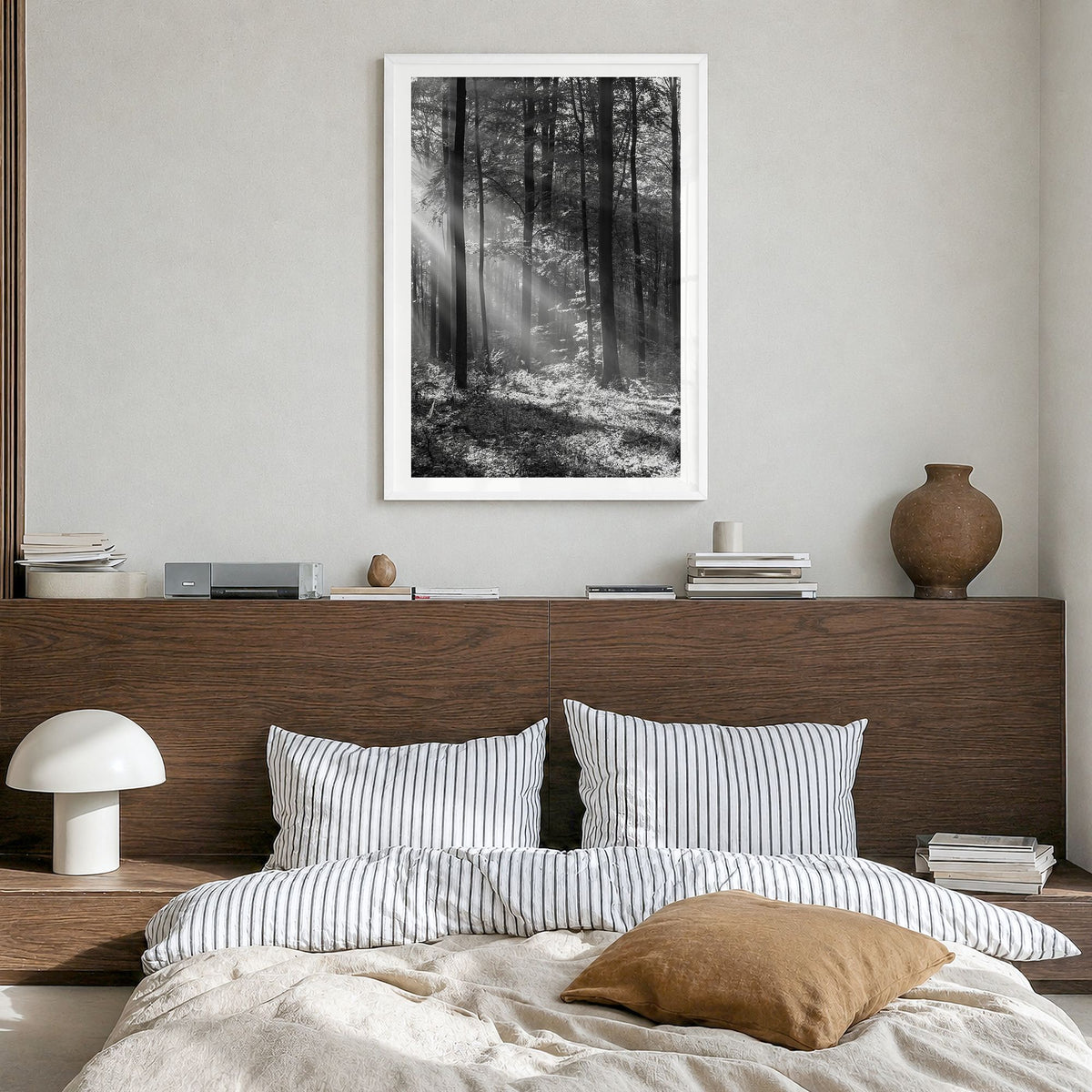 Forest Photo Poster in a white wood frame, hanging in a bedroom, white border