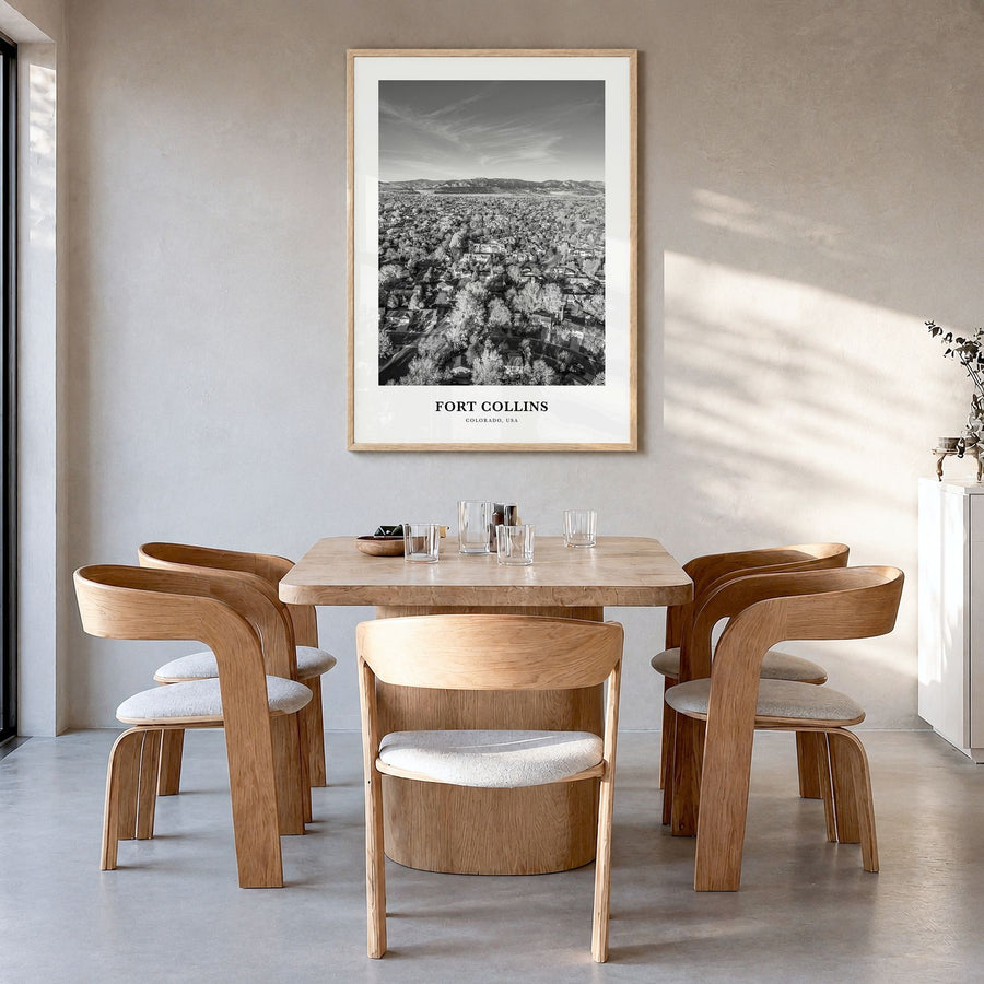 Fort Collins Classic Poster in a natural wood frame, hanging in a dining room