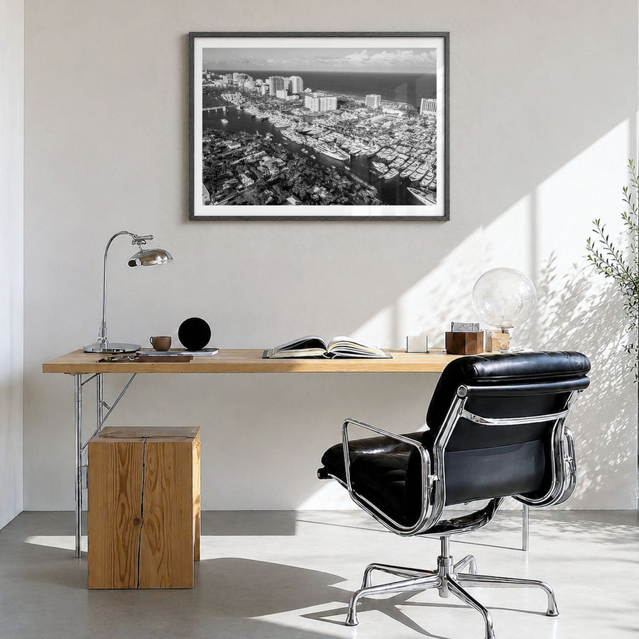 Fort Lauderdale Photo Poster in a black wood frame, hanging in a bright home office, white border