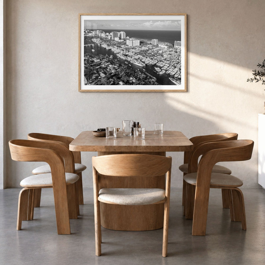 Fort Lauderdale Photo Poster in a natural wood frame, hanging in a dining room, white border