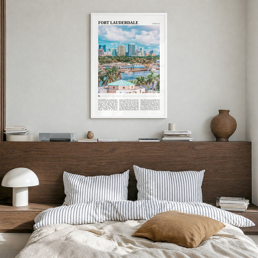 Fort Lauderdale Travel Poster in a white wood frame, hanging in a bedroom