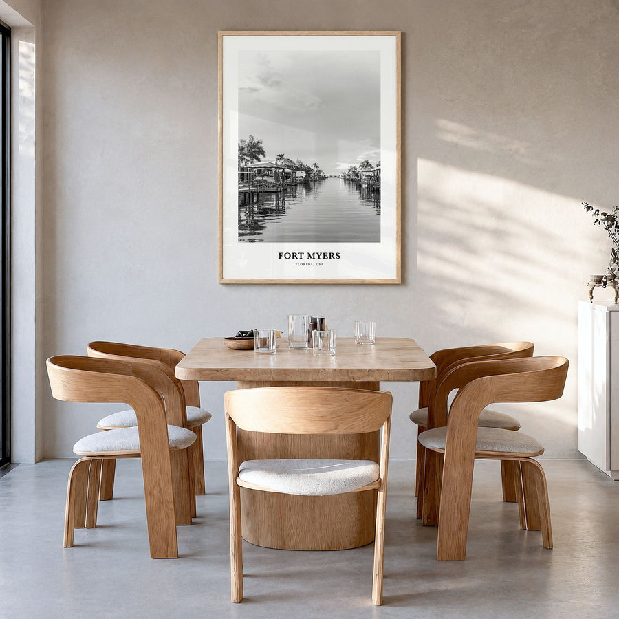 Fort Myers Classic Poster in a natural wood frame, hanging in a dining room