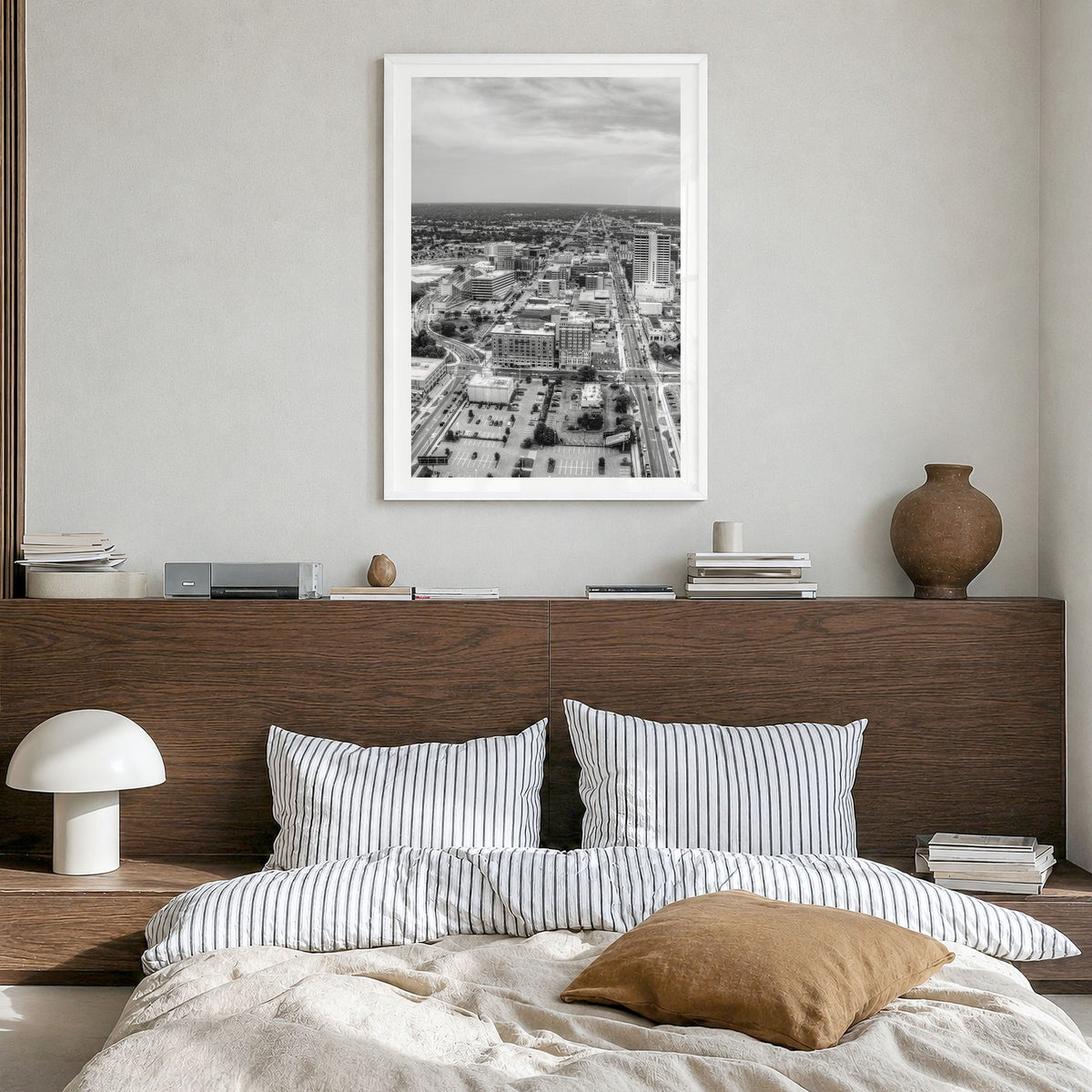 Fort Wayne Photo Poster in a white wood frame, hanging in a bedroom, white border