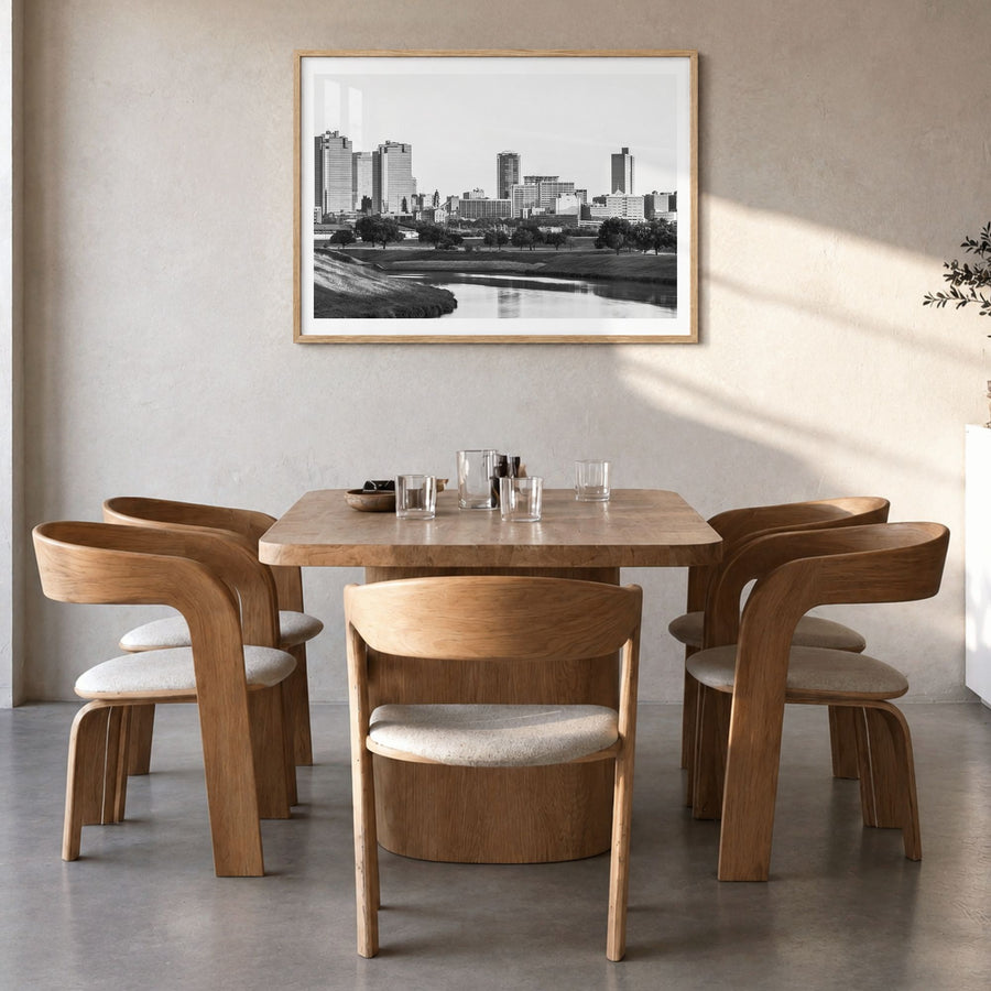 Fort Worth Photo Poster in a natural wood frame, hanging in a dining room, white border