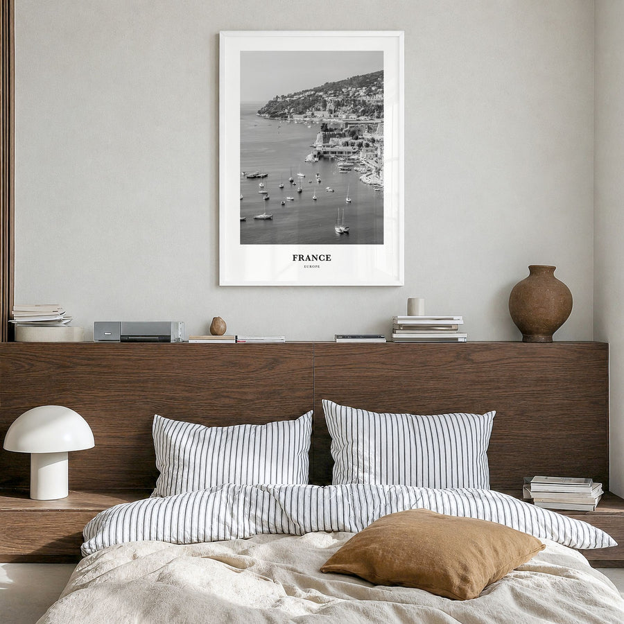 France Classic No 2 Poster in a white wood frame, hanging in a bedroom