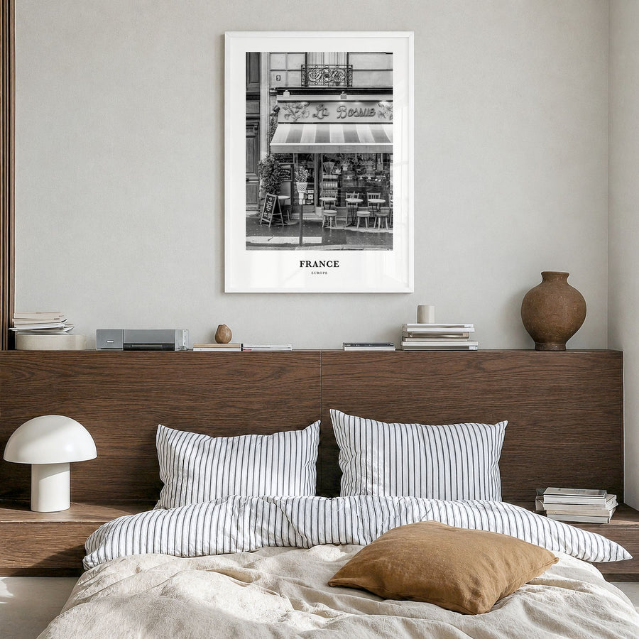 France Classic No 4 Poster in a white wood frame, hanging in a bedroom