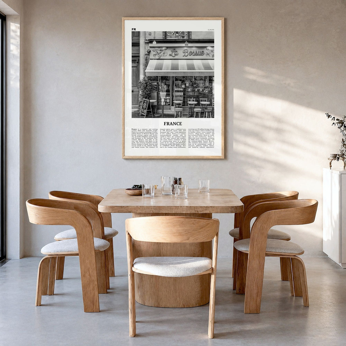 France Newspaper No 2 Poster in a natural wood frame, hanging in a dining room