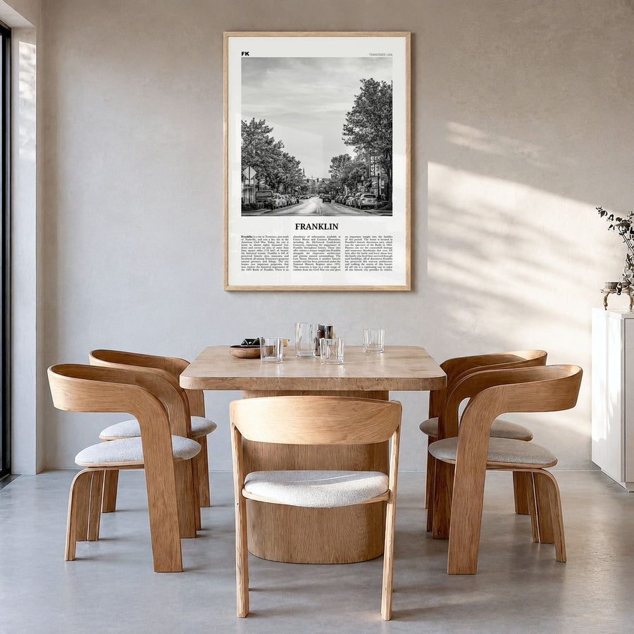 Franklin Newspaper Poster in a natural wood frame, hanging in a dining room
