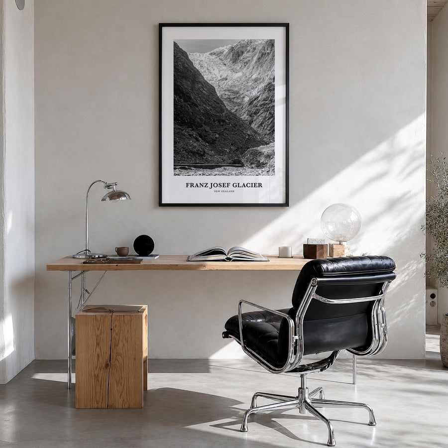 Franz Josef Glacier black & white classic poster of New Zealand – vertical wall art in black wood frame, hanging on wall