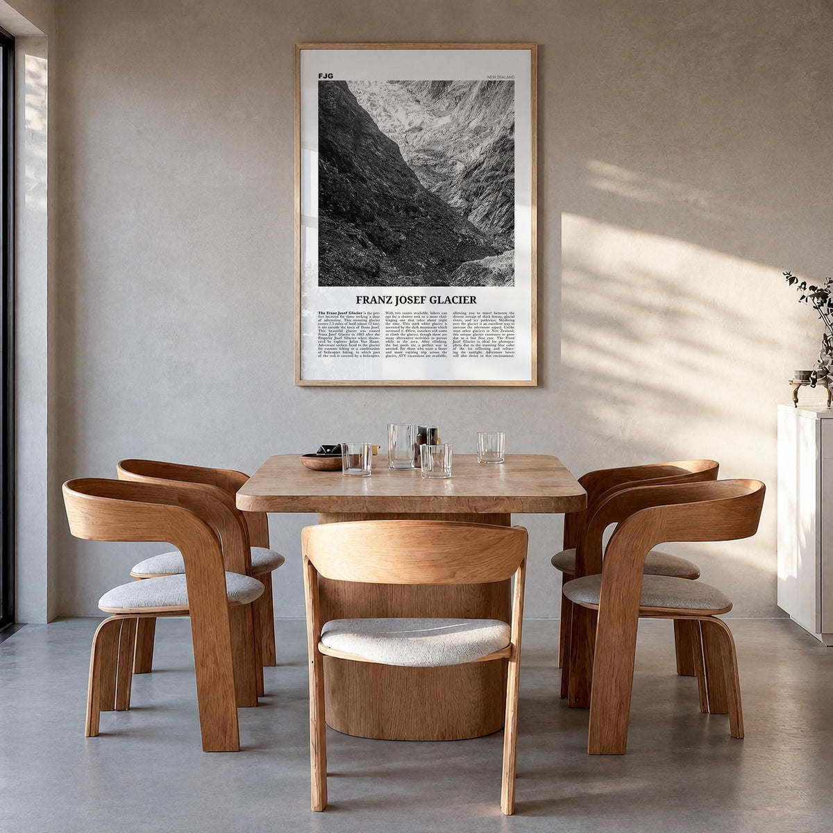 Franz Josef Glacier black & white newspaper poster of New Zealand – vertical wall art in natural wood frame, hanging on wall