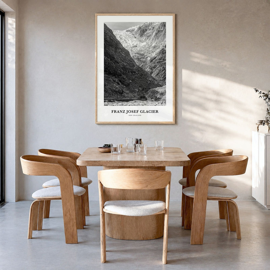 Franz Josef Glacier Classic Poster in a natural wood frame, hanging in a dining room