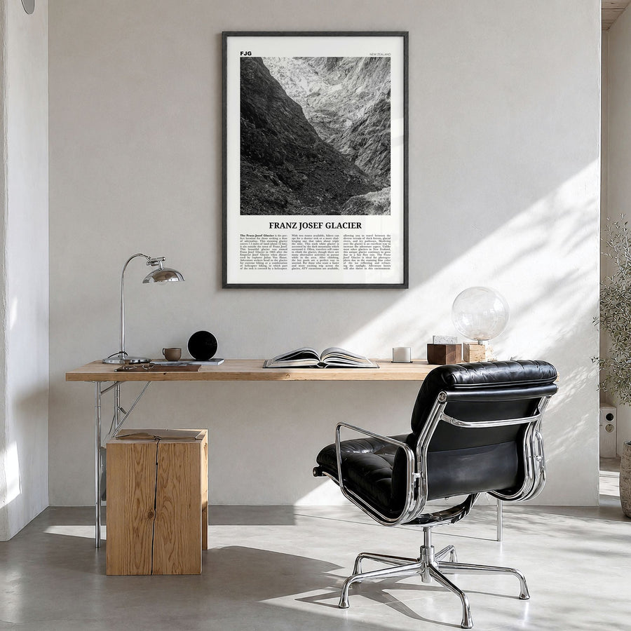 Franz Josef Glacier Newspaper Poster in a black wood frame, hanging in a bright home office