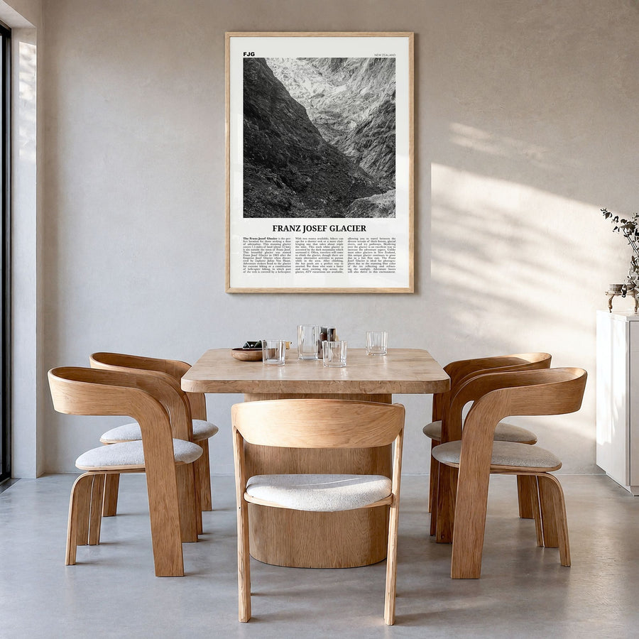 Franz Josef Glacier Newspaper Poster in a natural wood frame, hanging in a dining room