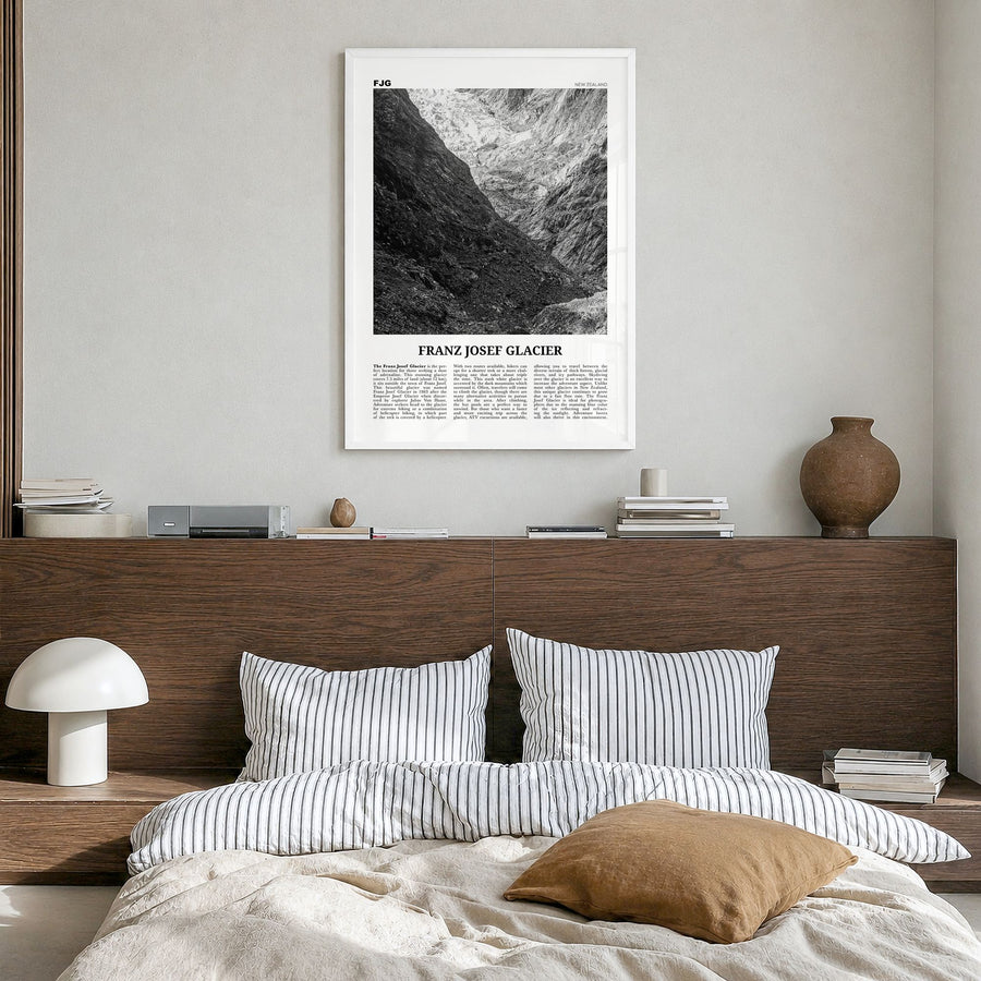 Franz Josef Glacier Newspaper Poster in a white wood frame, hanging in a bedroom