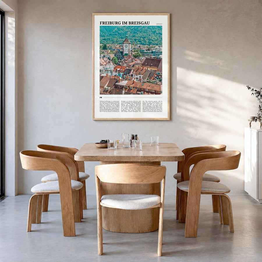 Freiburg im Breisgau Travel No 2 Poster in a natural wood frame, hanging in a dining room
