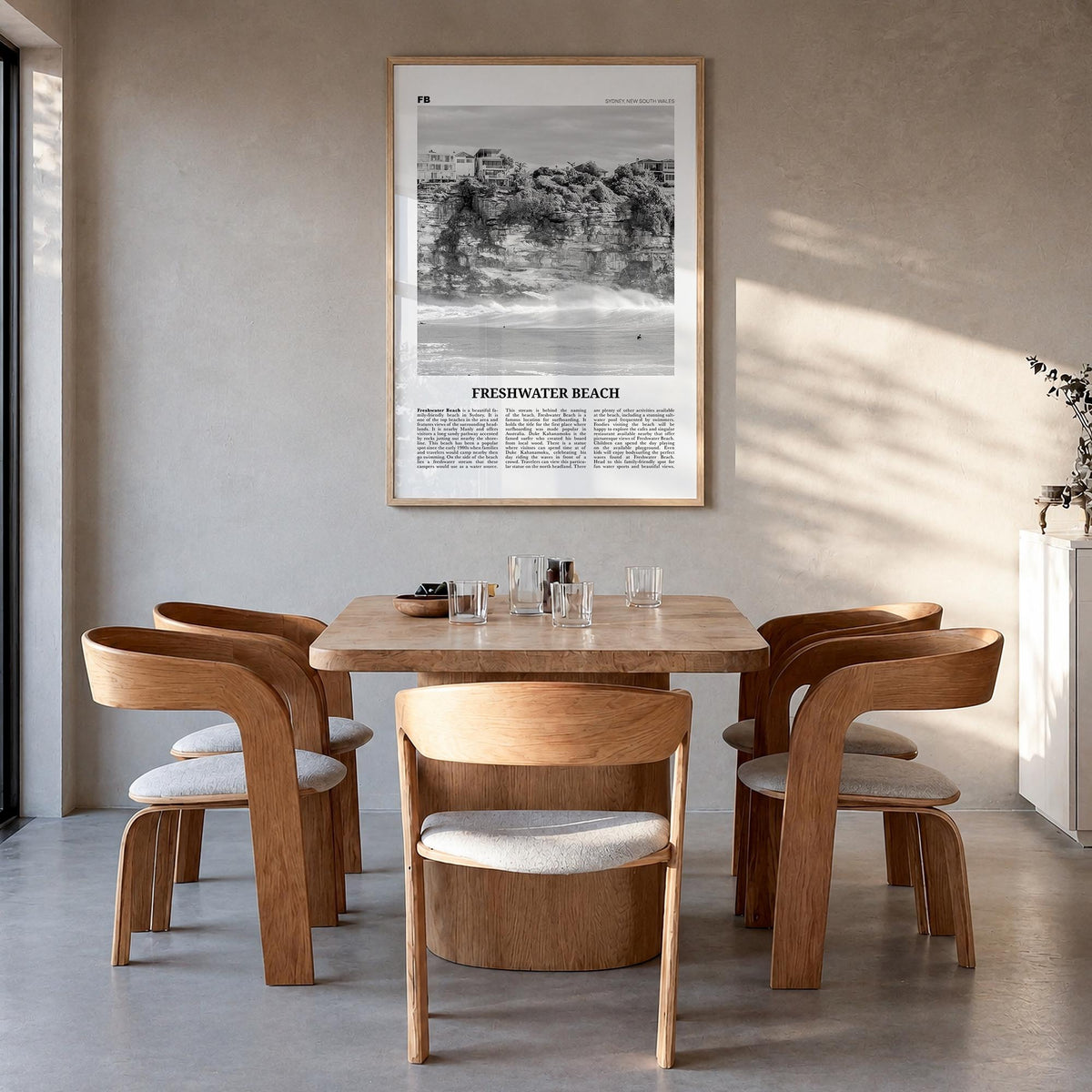 Freshwater Beach black & white newspaper poster of Australia – vertical wall art in natural wood frame, hanging on wall