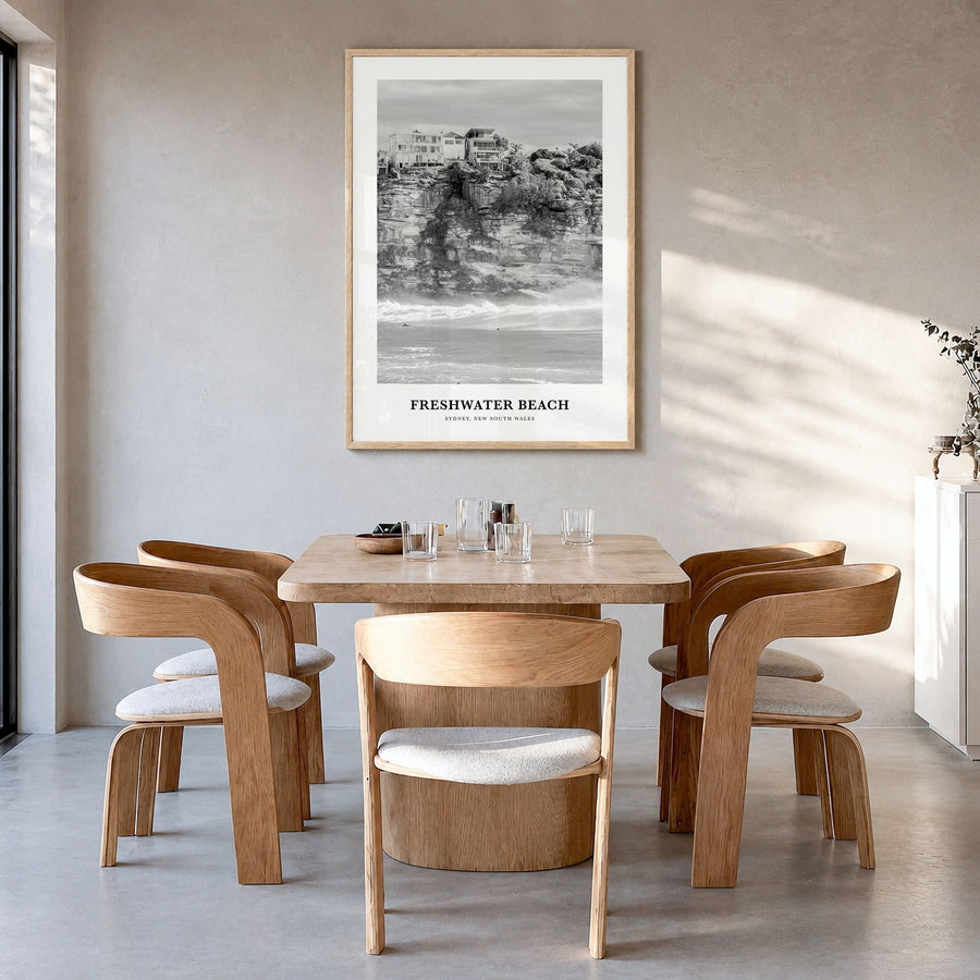 Freshwater Beach Classic Poster in a natural wood frame, hanging in a dining room