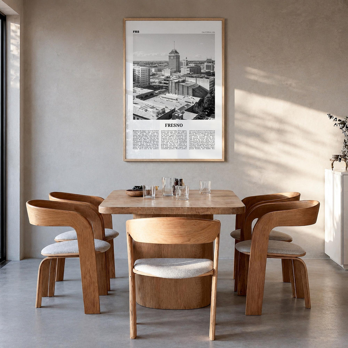Fresno black & white newspaper poster of California, USA – vertical wall art in natural wood frame, hanging on wall