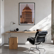 Fresno colorful photo poster of California, USA – vertical wall art in black wood frame with white border, hanging on wall