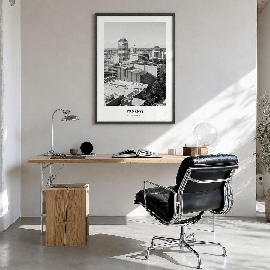 Fresno Classic Poster in a black wood frame, hanging in a bright home office