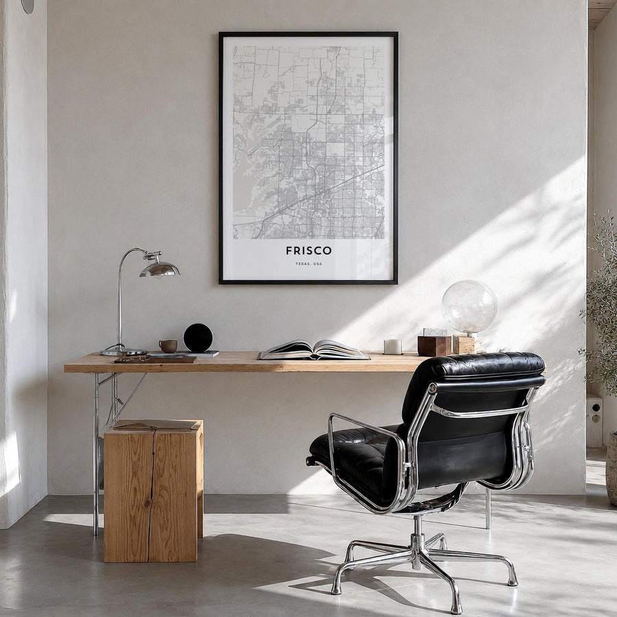 Frisco black & white map poster of Texas, USA – vertical wall art in black wood frame, hanging on wall