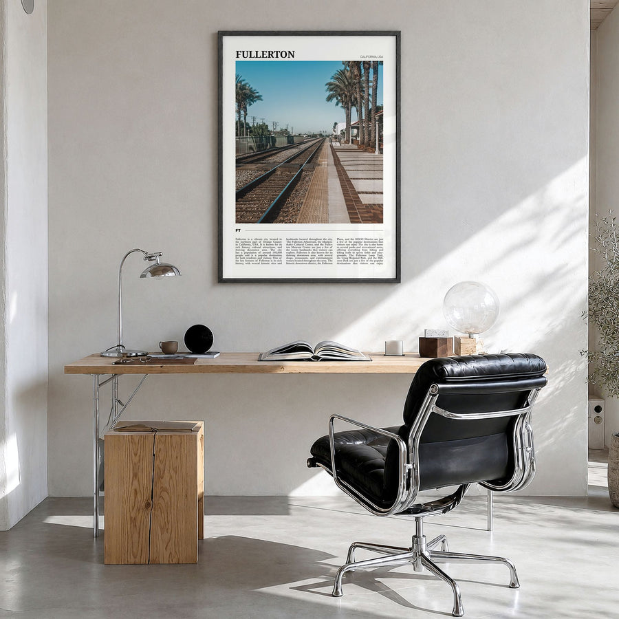 Fullerton Travel Poster in a black wood frame, hanging in a bright home office