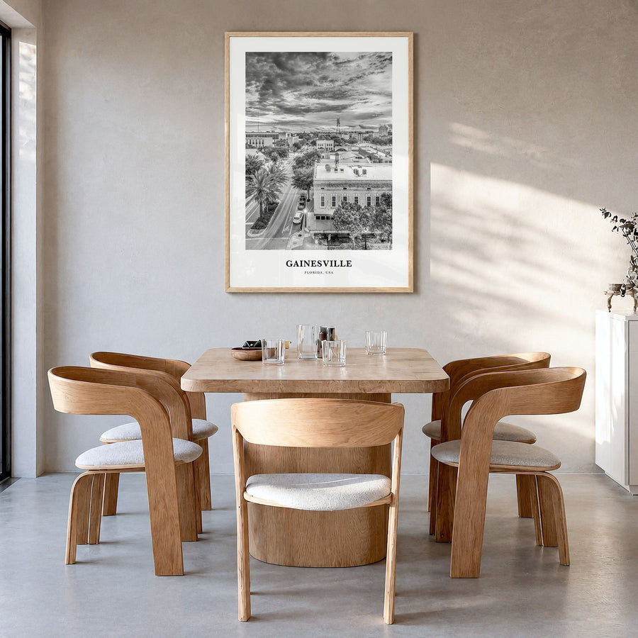 Gainesville Classic Poster in a natural wood frame, hanging in a dining room