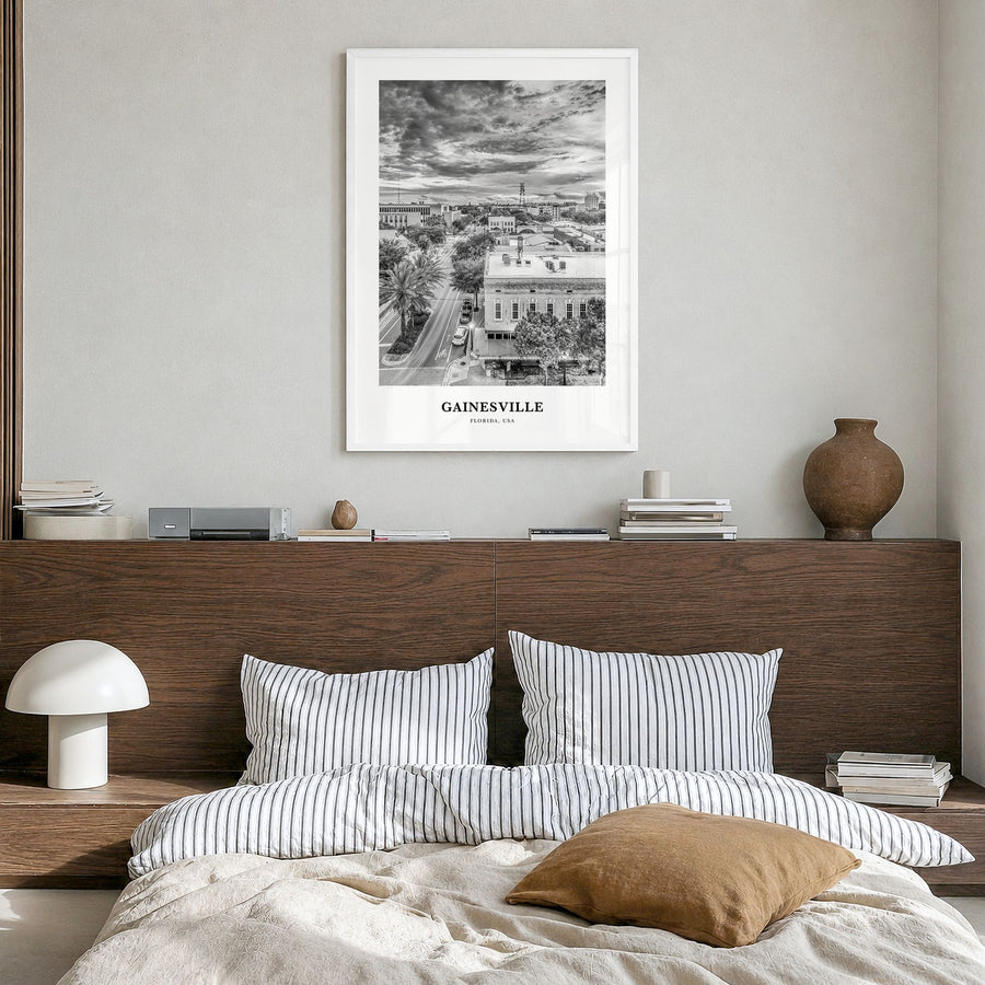 Gainesville Classic Poster in a white wood frame, hanging in a bedroom