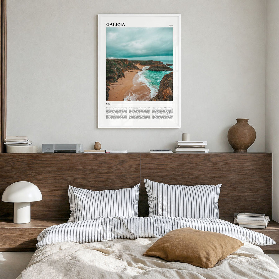 Galicia Travel Poster in a white wood frame, hanging in a bedroom